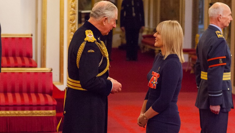 Prince presents CEO with CBE